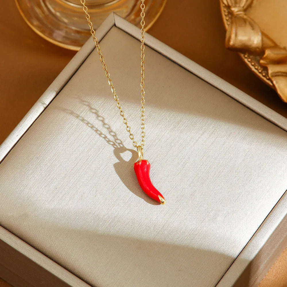 Titanium steel necklace with indie cherry, strawberry, and pepper motif pendant on an O-ring chain.