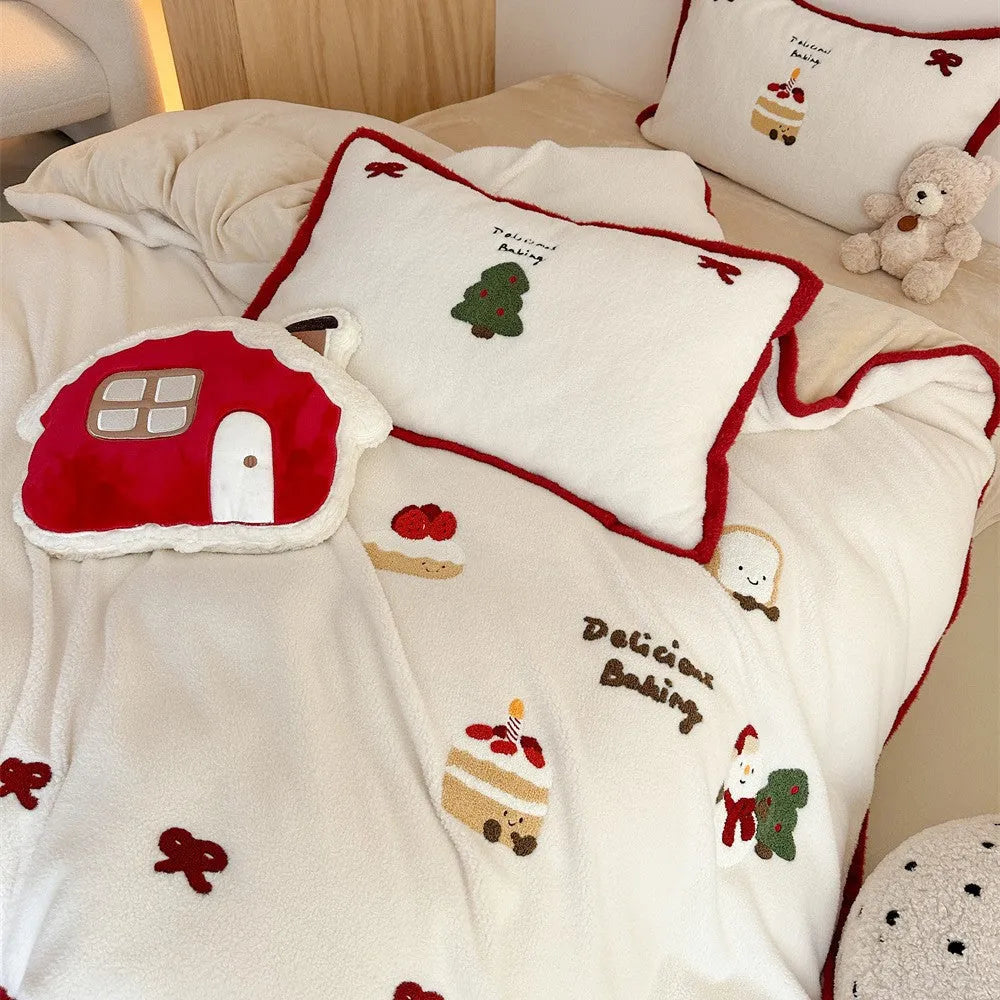 Girl's Heart cartoon pattern four-piece bedding set with winter Christmas theme on bed