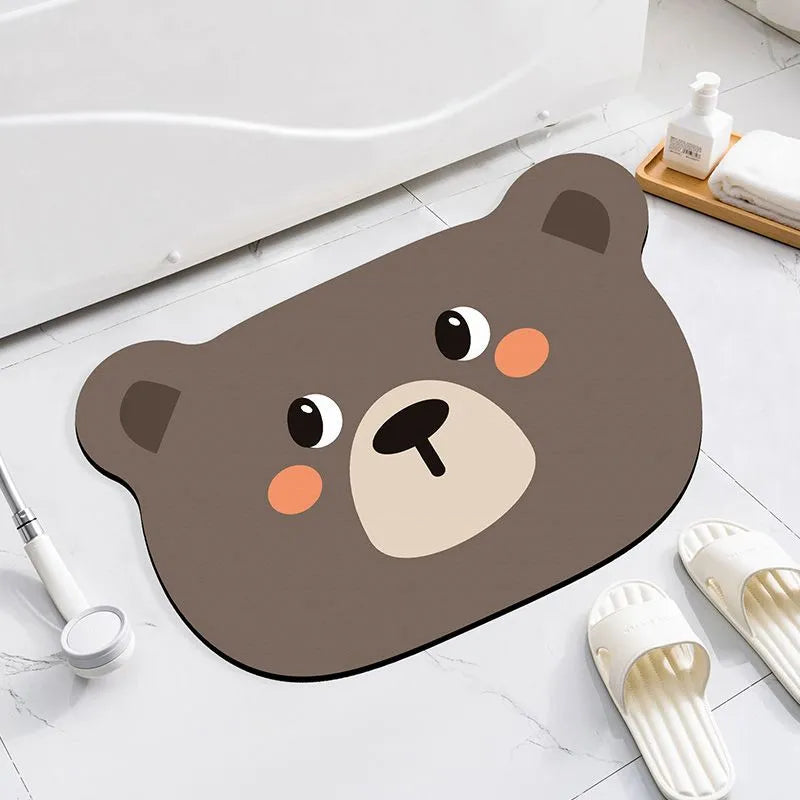 Diatomaceous earth bathroom mat with cartoon animal design on alien-shaped base