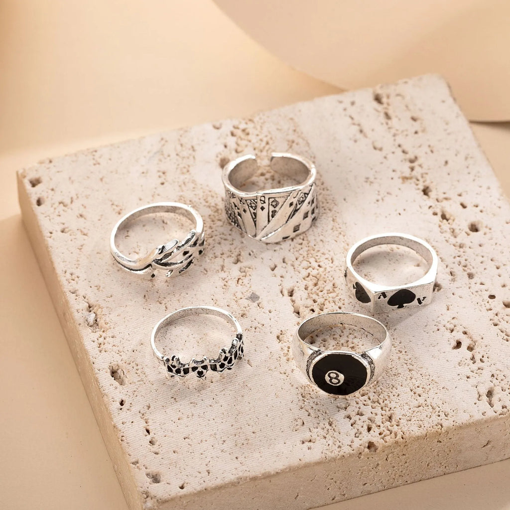 Black alloy poker ring with spade design and adjustable band