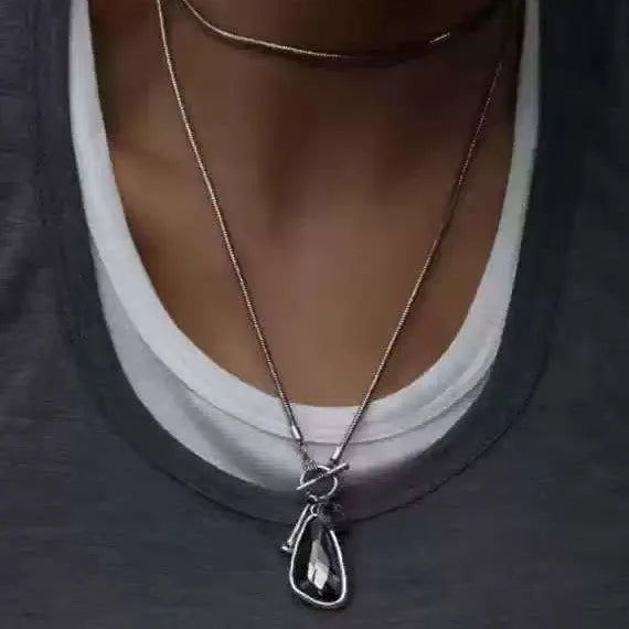 Women's long necklace with geometric pendant on snake bone chain in blue, champagne or grey