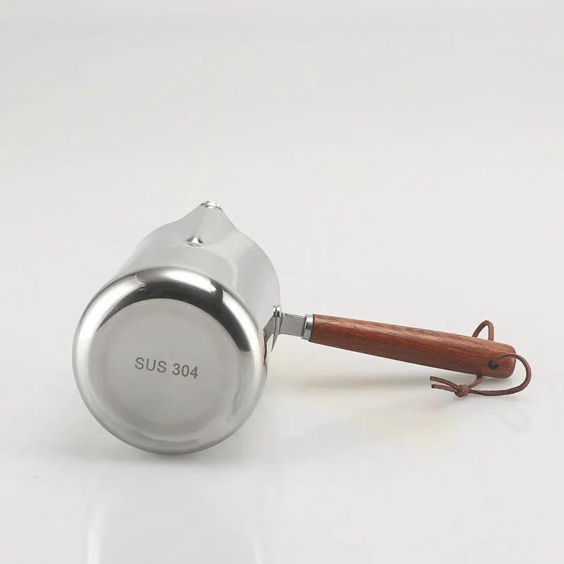 Stainless steel garland pattern coffee cup with a wooden handle in a simple modern style.