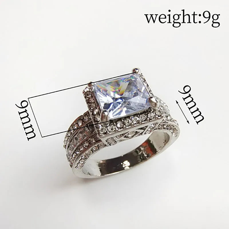 Geometric women's silver fashion ring with round elements in gold and white electroplated finishes