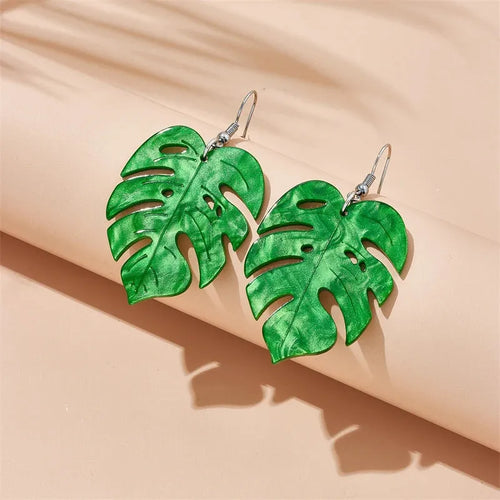 Drop-shaped acrylic earrings with summer coconut design in five colour variations on alloy ear hooks