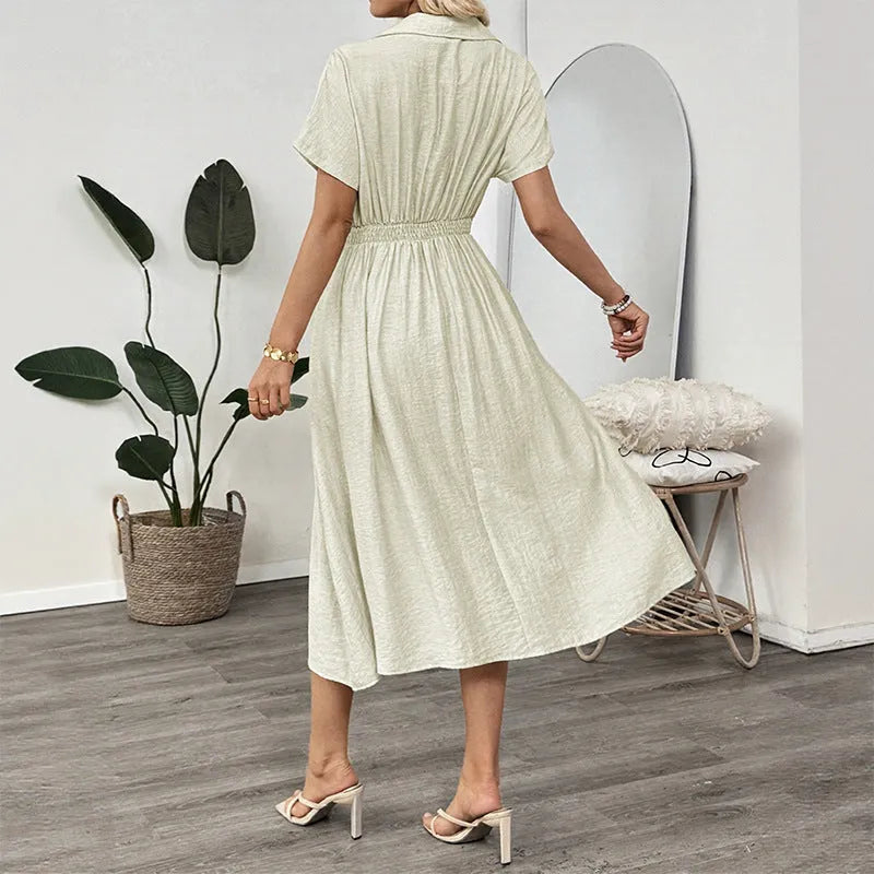 Light green women's twill shirt dress with lapel collar, fitted waist, and a chest pocket.