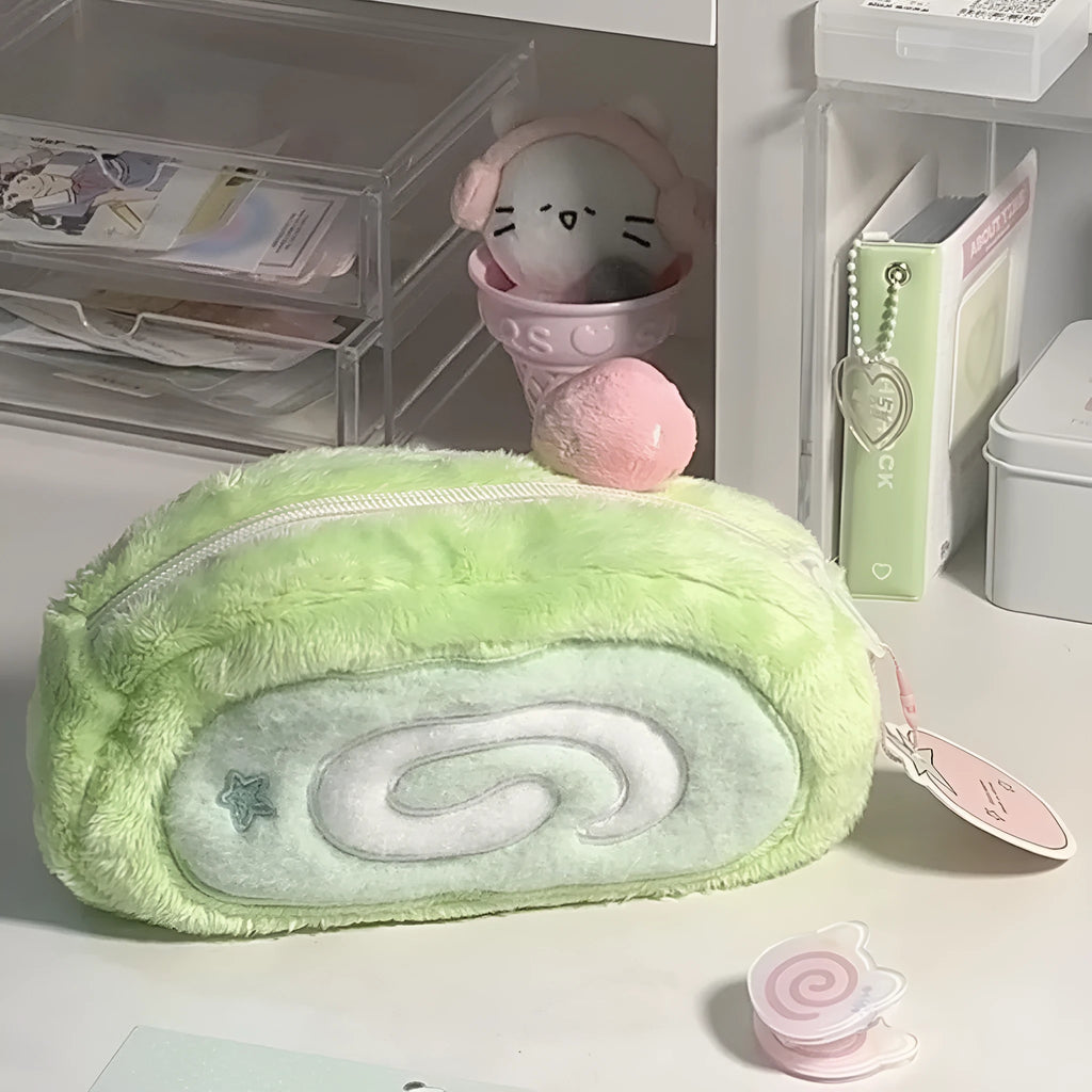 Velvet pencil case with a Swiss roll cake design, shown in a rolled-up position.