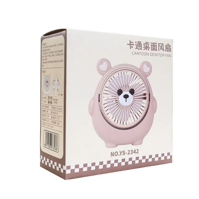 Cute dog-themed USB desktop electric fan in one of six colour options on a desk.