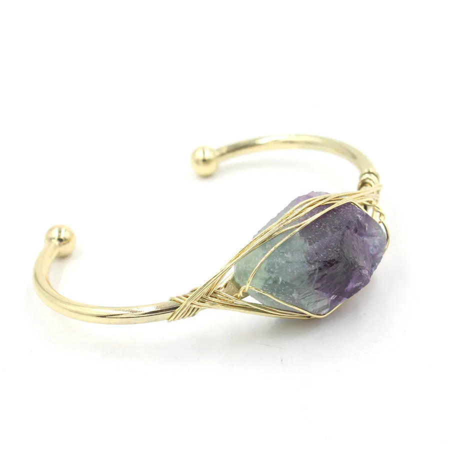 Natural raw gemstone crystal bracelet showing 8mm winding design with simple opening clasp in amethyst colour