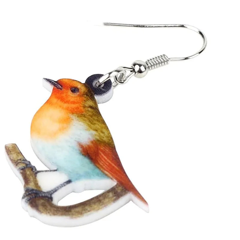 Acrylic Blue Titmouse pendant earrings with geometric and animal zodiac design including snake elements
