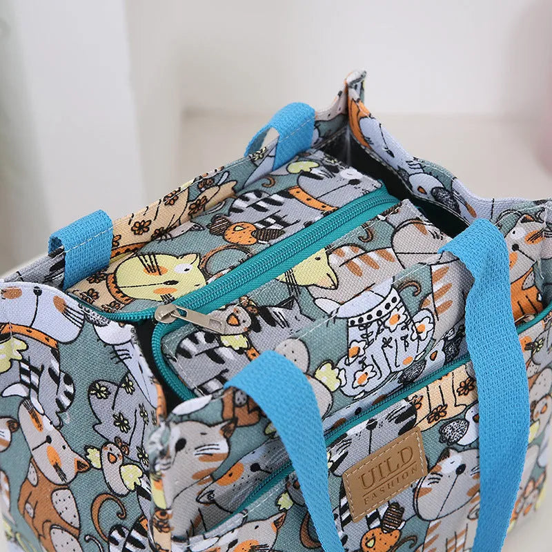 Women's printed canvas handbag with large capacity and multiple colour pattern options