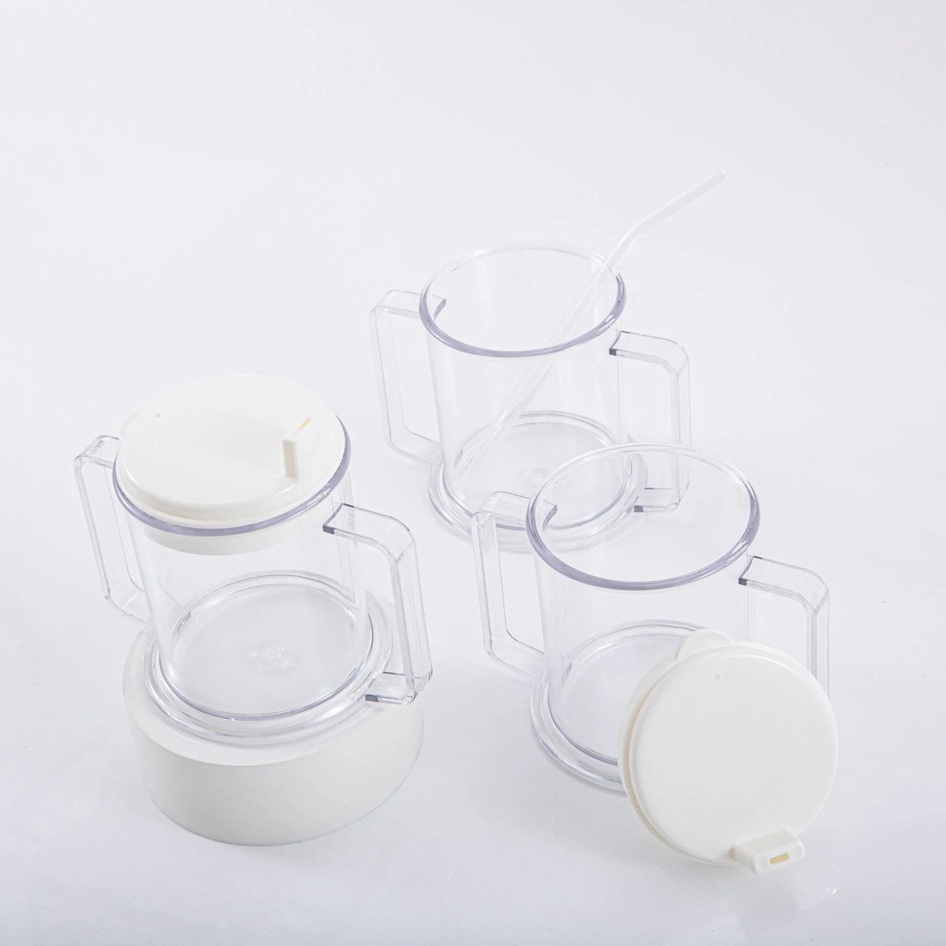 Transparent spill-proof plastic drinking cup showing 14cm height and 12cm diameter