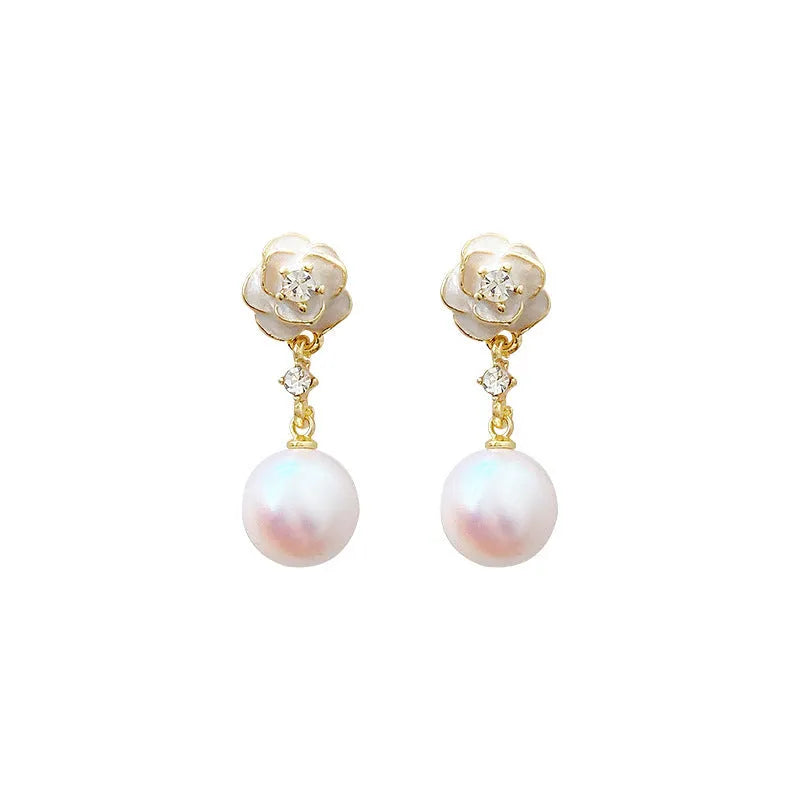 A pair of women's alloy stud earrings shaped like a detailed camellia flower in a 'Camellia' colour.