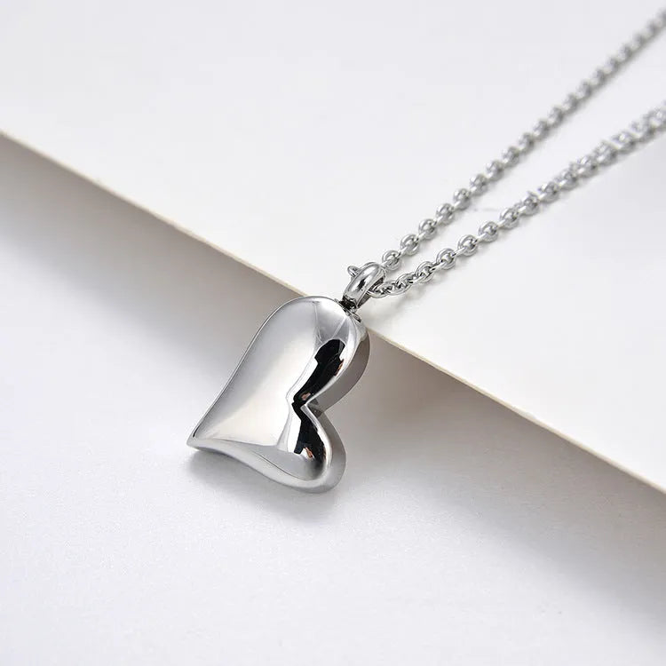 Silver stainless steel curved peach heart pendant necklace with love pattern on adjustable chain