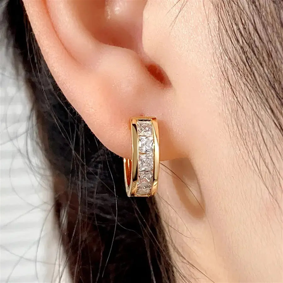 A pair of geometric quadrilateral copper earrings for women in gold and silver colour options