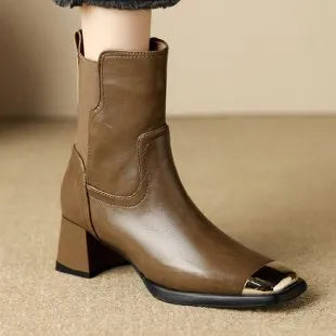 Brown women's high-heel Martin boots with a side zipper and cowhide leather upper.