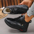 Black and red women's velvet indoor shoes with rubber soles and low tube socks design.