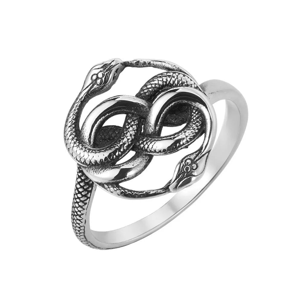 A titanium steel double snake ring in a steel colour retro style, shown on a finger.