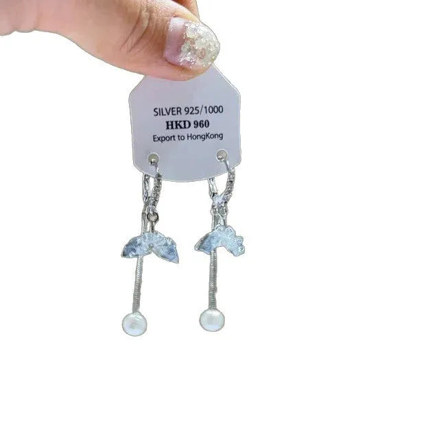 Silver-colour geometric heart-shaped clip-on earrings with rhinestones and dangling star tassels.