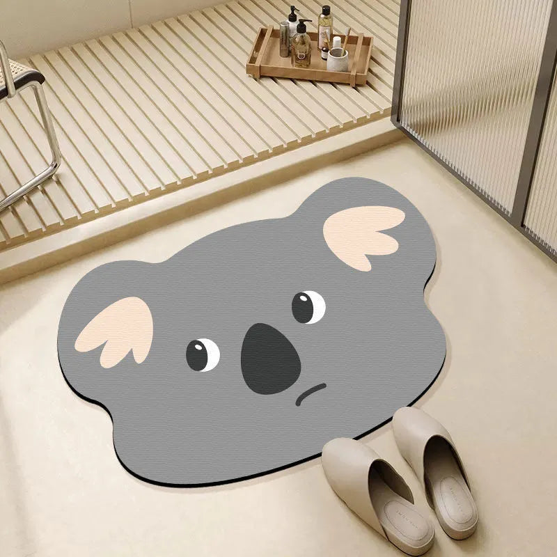 Diatomaceous earth bathroom mat with cartoon animal design on alien-shaped base