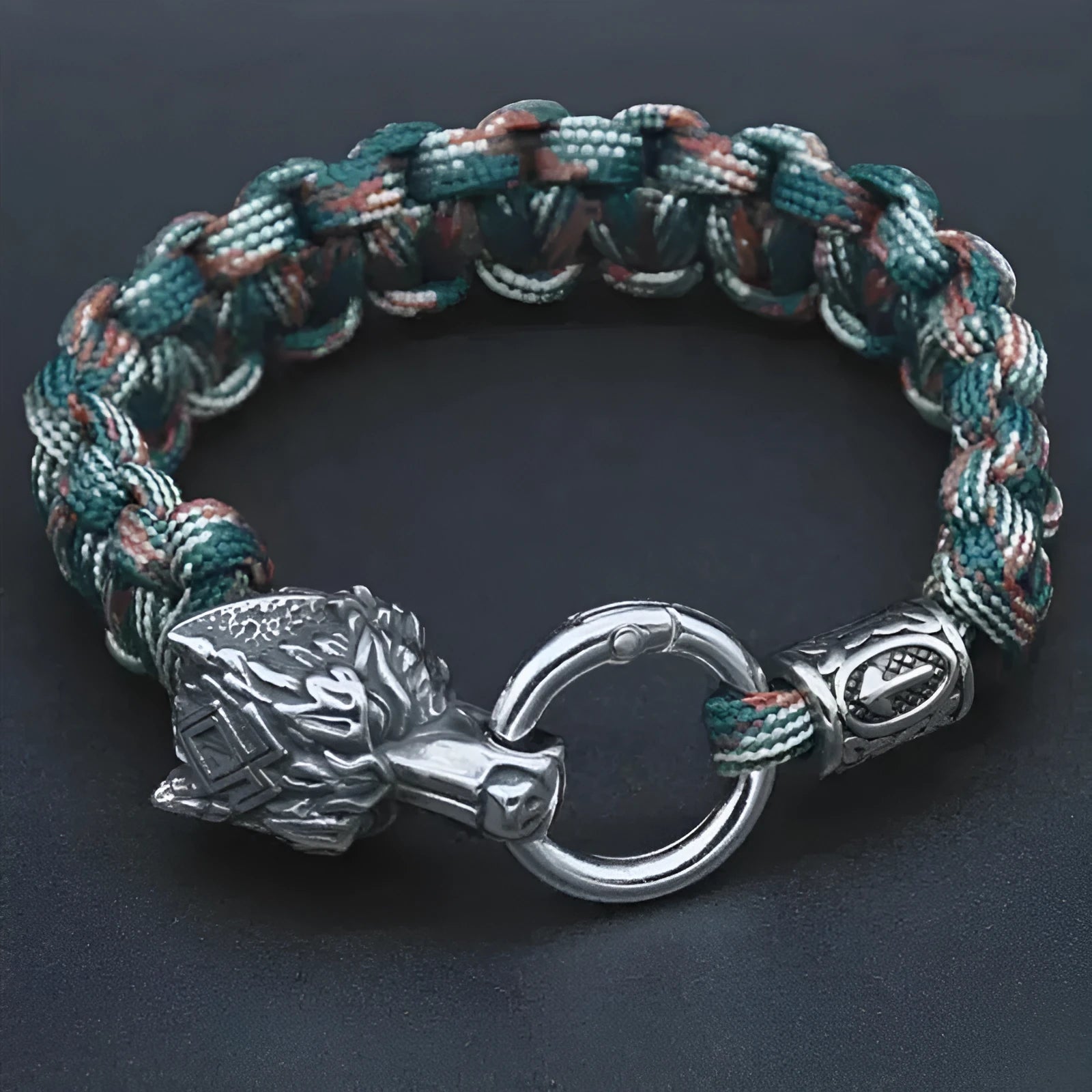 Polished stainless steel wolf head bracelet in camouflage colour showing animal modelling detail
