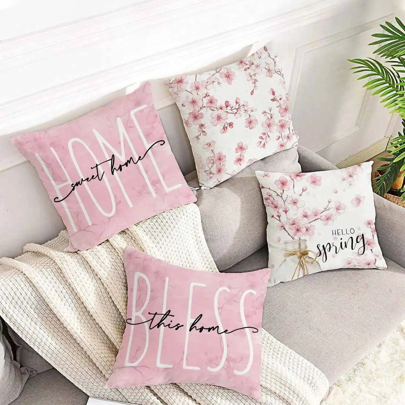 45cm square short velvet cushion cover with cherry blossom and letter pattern in one of four available colours.