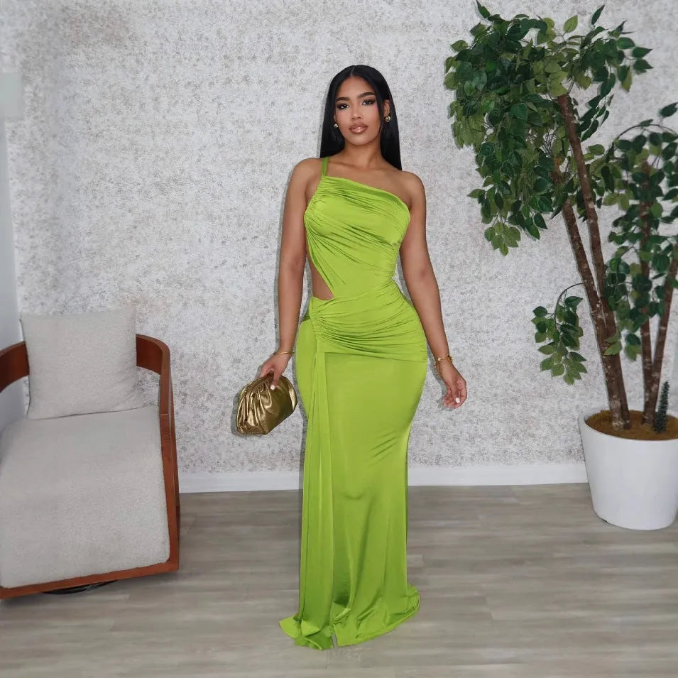 Women's solid colour one-shoulder pleated midi dress in polyester fabric on a model.