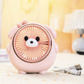 Cute dog-themed USB desktop electric fan in one of six colour options on a desk.