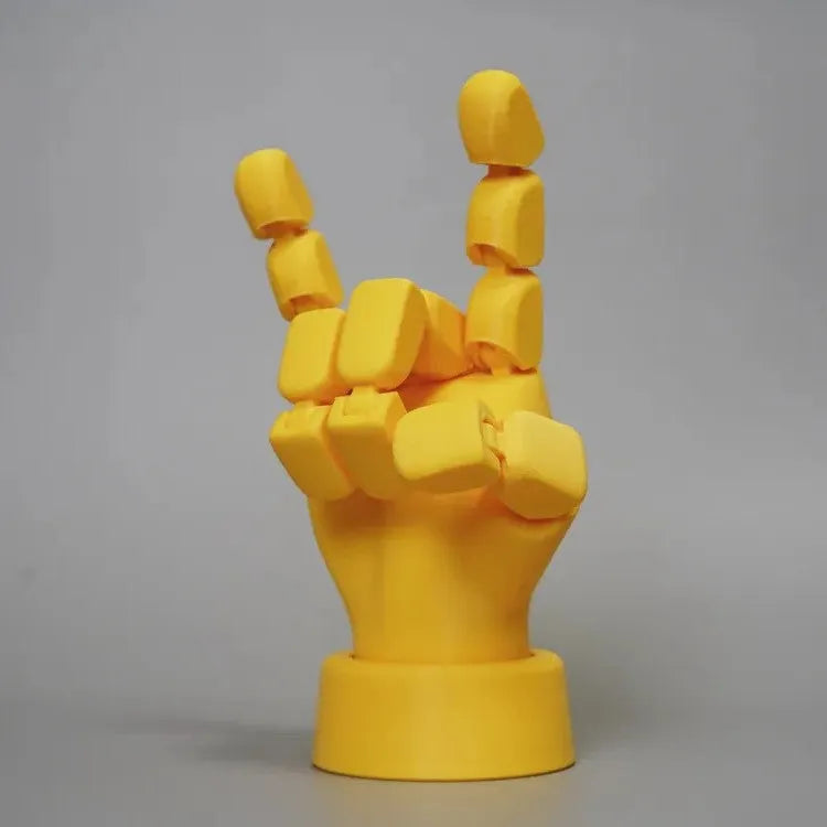 Yellow movable joint hand prop ornament with American style detailing on white background
