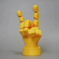 Yellow movable joint hand prop ornament with American style detailing on white background