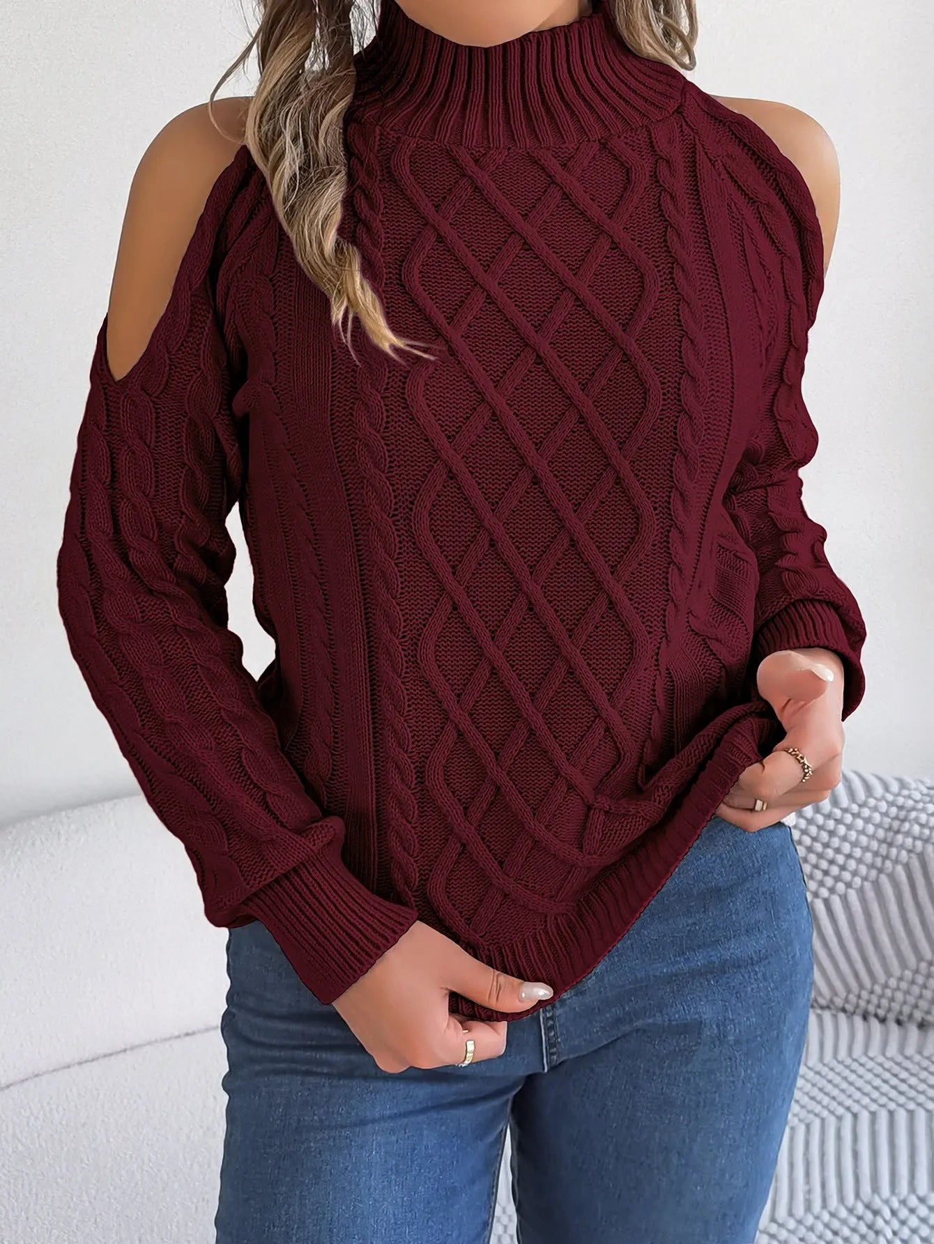 Women's strapless grey acrylic sweater with lantern sleeves and twisted pattern detail