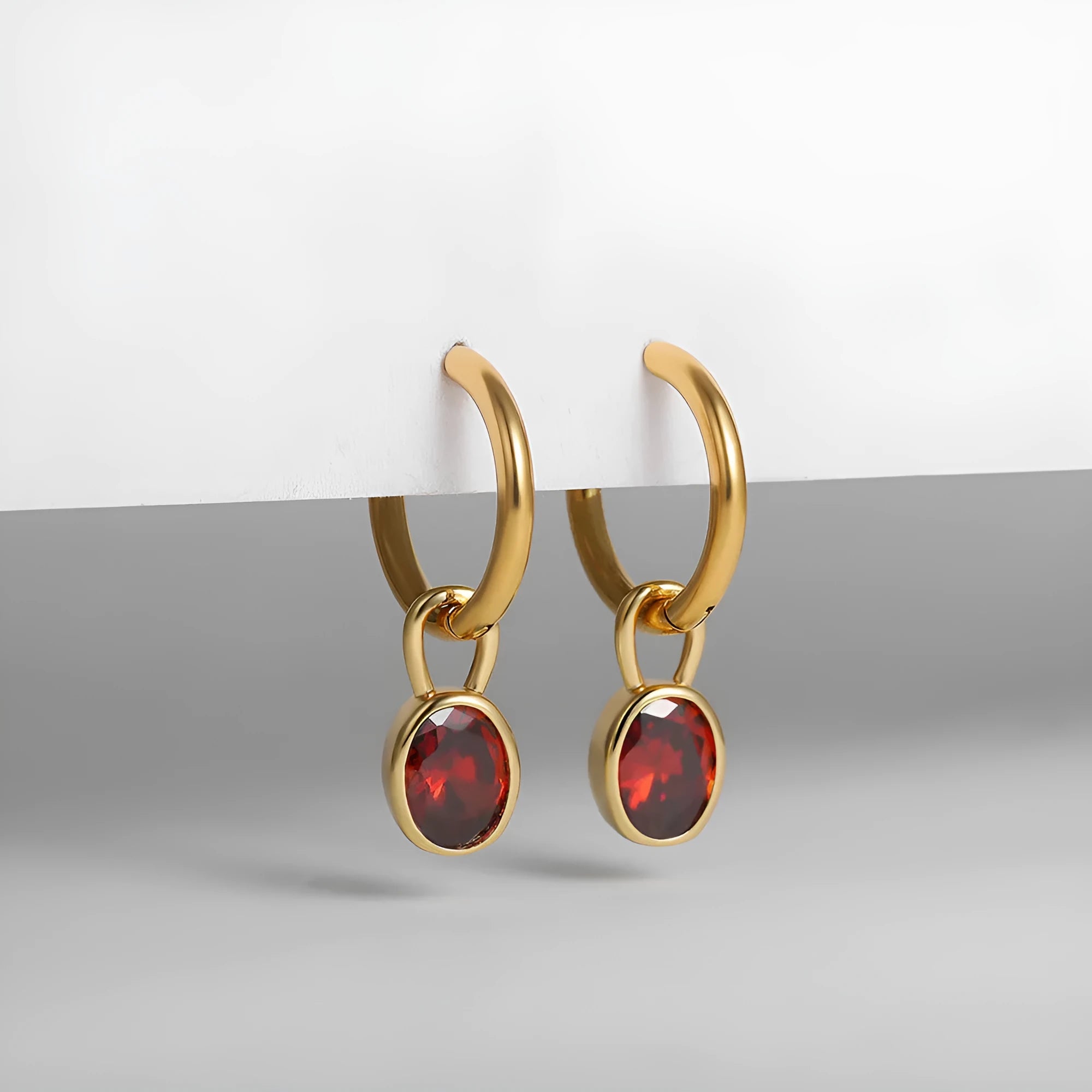 Retro oval zircon earrings in copper showing six colour variations