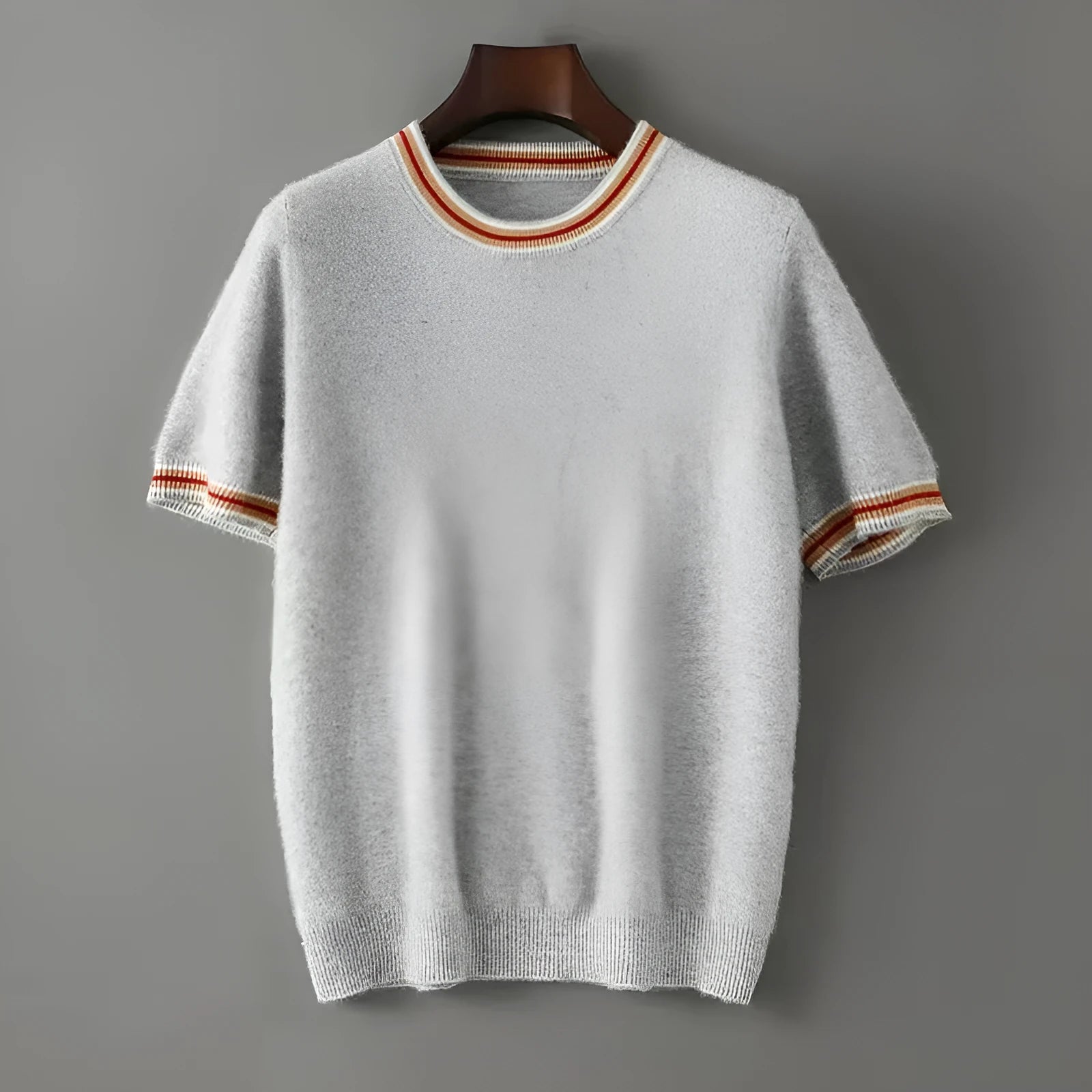 Men's grey pure wool short sleeve sweater with a round neck on a hanger.