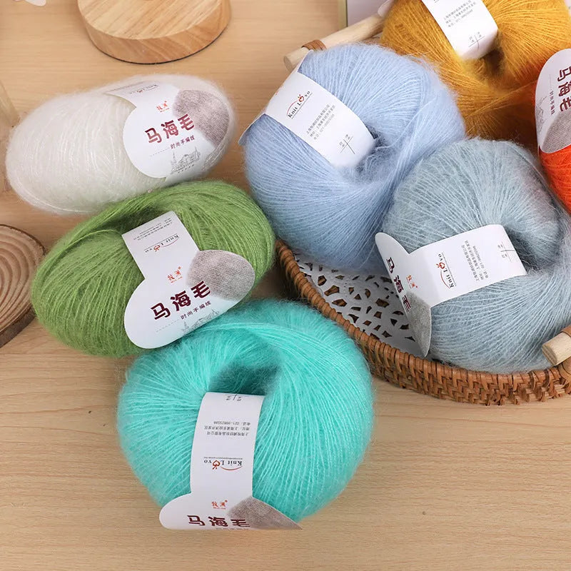 Mohair DIY scarf knitting kit showing wool ball with hand-woven Inverness thread in multiple colour options