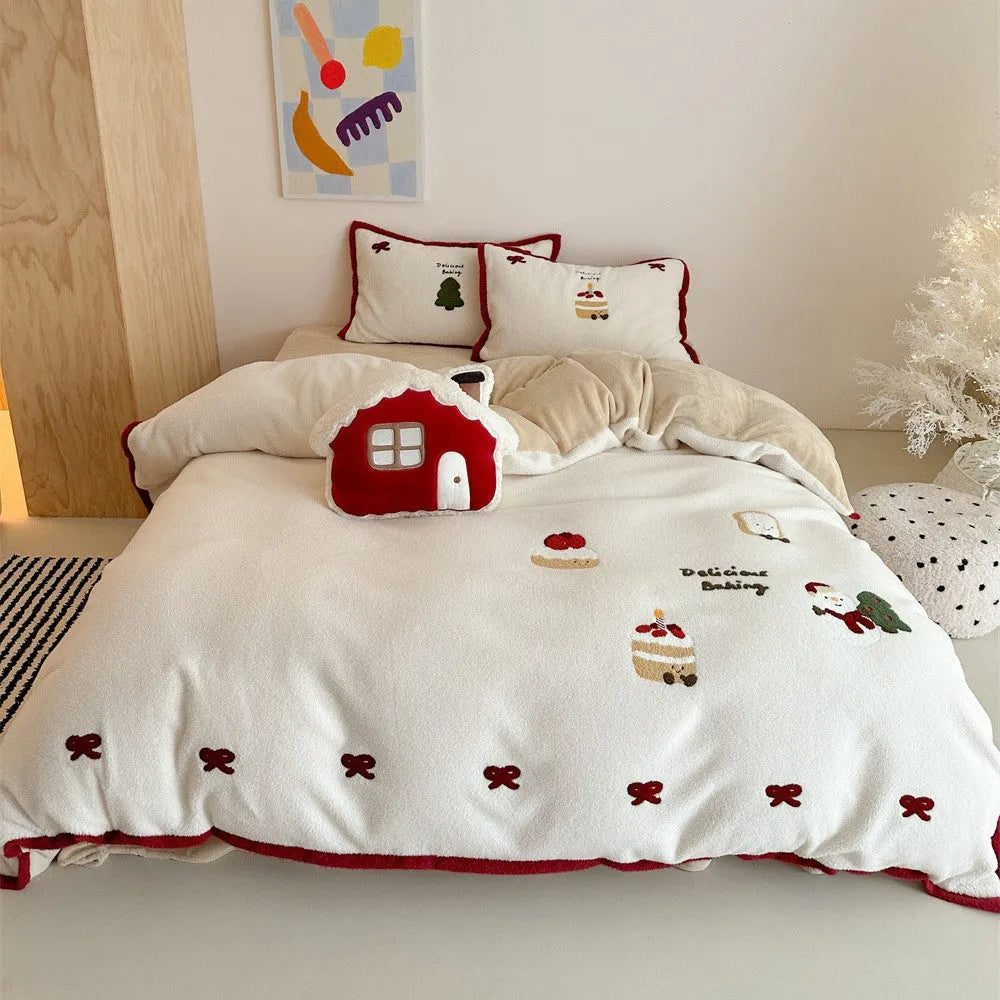 Girl's Heart cartoon pattern four-piece bedding set with winter Christmas theme on bed