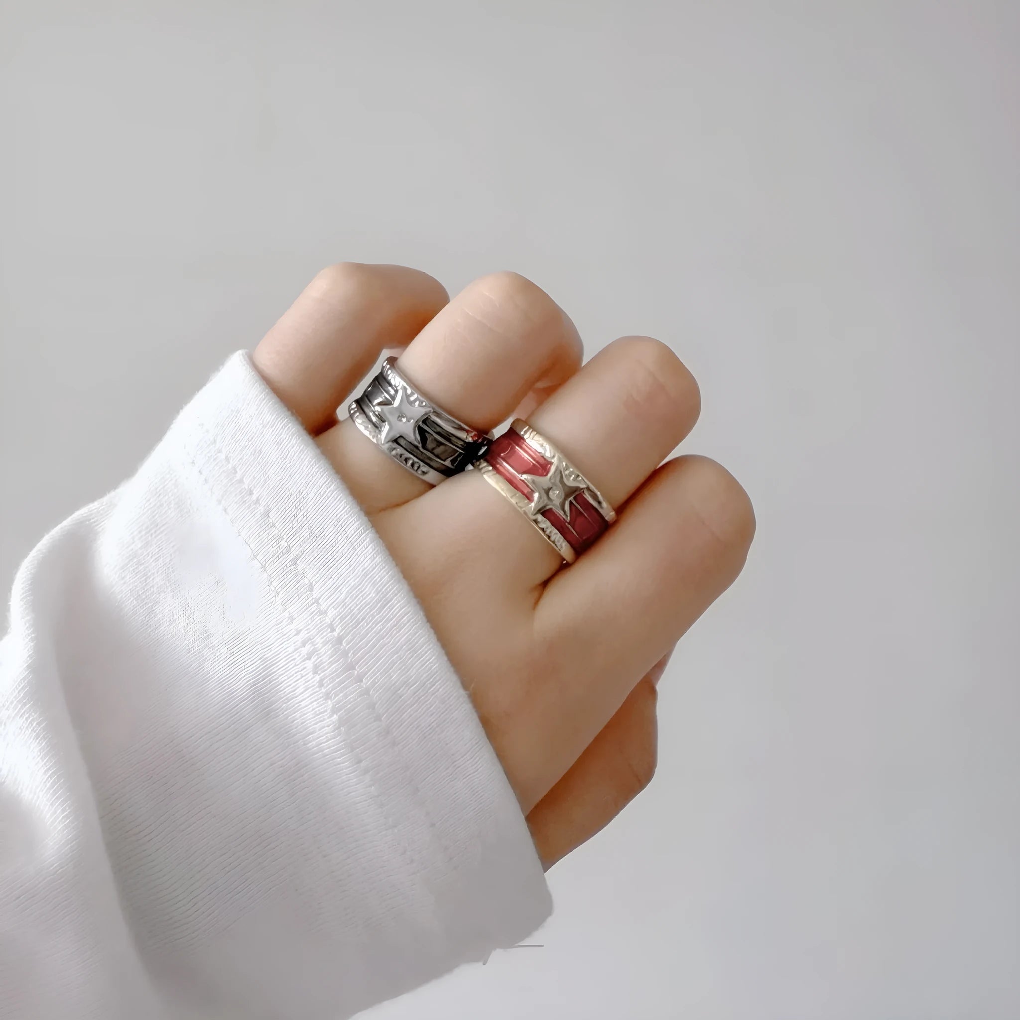 Adjustable geometric drop oil ring for women in copper with distressed finish and lines pattern
