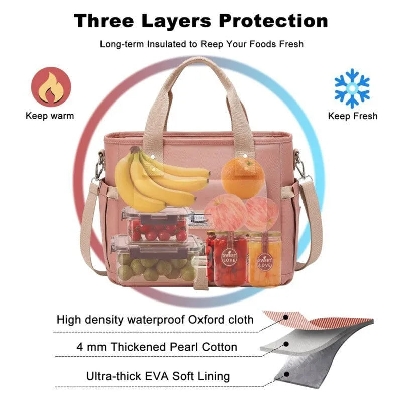 A portable cube-shaped picnic bag with a removable shoulder strap and a side pocket, shown in pink colour.