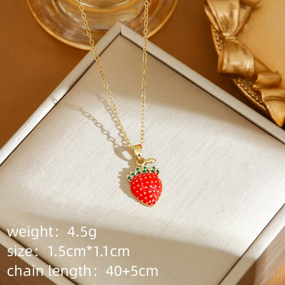 Titanium steel necklace with indie cherry, strawberry, and pepper motif pendant on an O-ring chain.