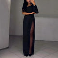 Black women's jumpsuit with oblique shoulder design and high slit on the leg.