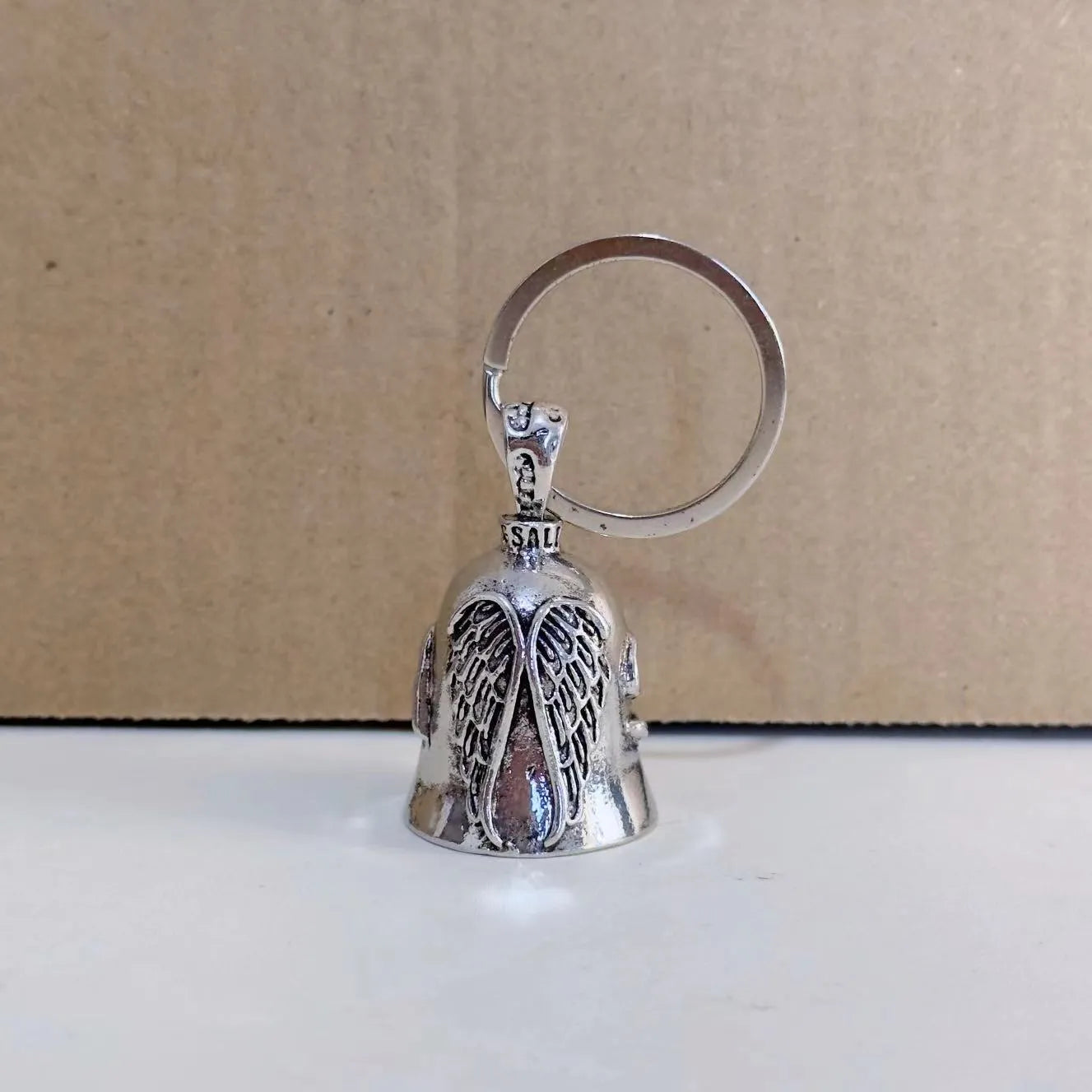 Vintage white angel feather necklace and matching keychain made from alloy metal.