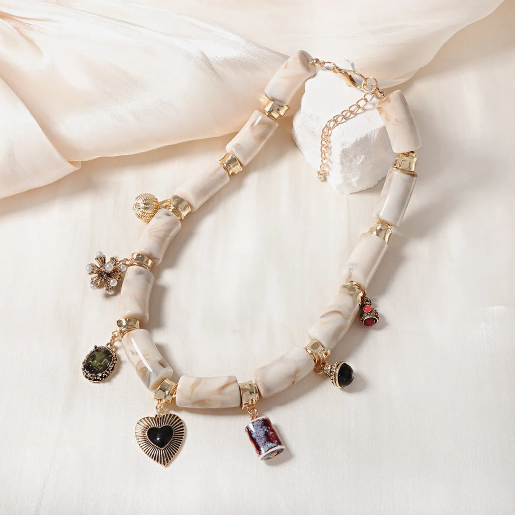 Women's heart-shaped bamboo and resin necklace with electroplated finish in picture colour