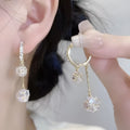 Women's silver drop earrings with tassel ball and rhinestone ball double pendant design, clip-on fastening
