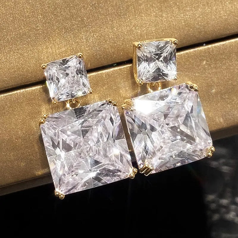 Geometric square copper earrings with quadrilateral design in white gold or golden colour finishes
