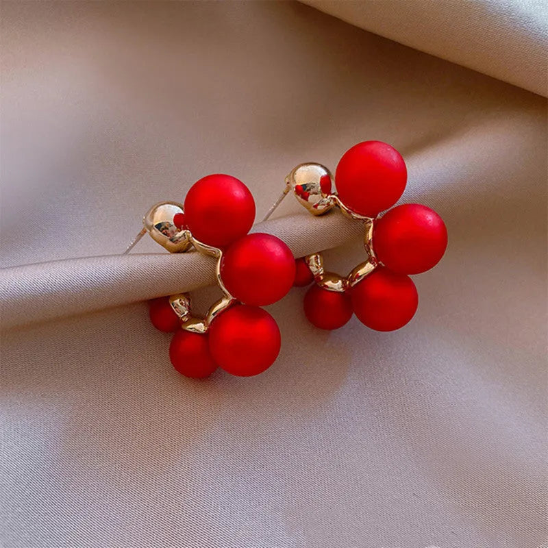 Red bell earrings for women made from alloy with butterfly clasp fastenings