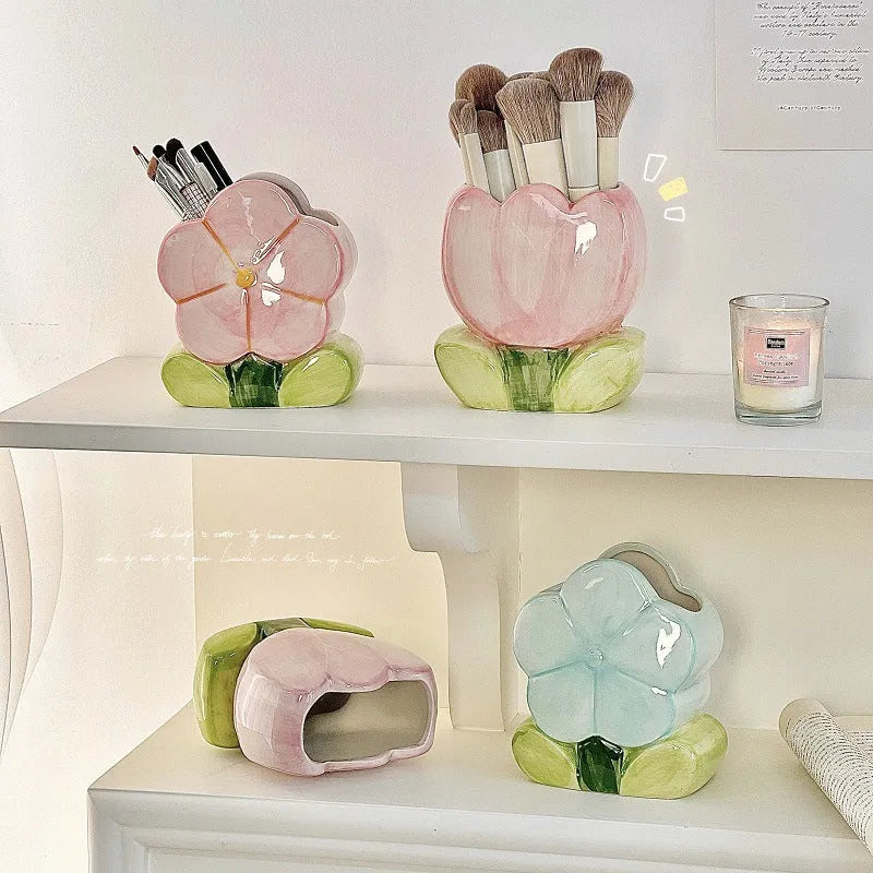 Ceramic floral pen holder storage box on desk with blue flower pattern