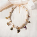 Women's heart-shaped bamboo and resin necklace with electroplated finish in picture colour
