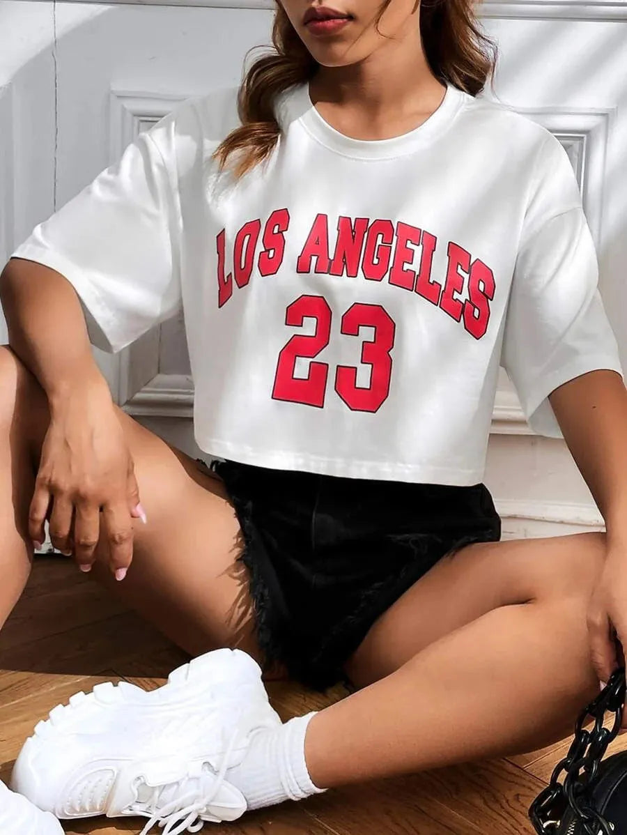 Women's black cotton t-shirt with white English letters printing and navel exposure detail
