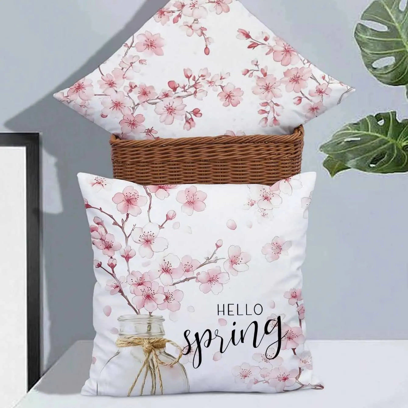 45cm square short velvet cushion cover with cherry blossom and letter pattern in one of four available colours.