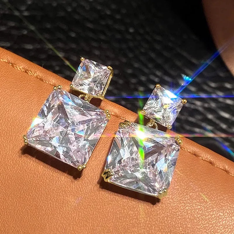 Geometric square copper earrings with quadrilateral design in white gold or golden colour finishes