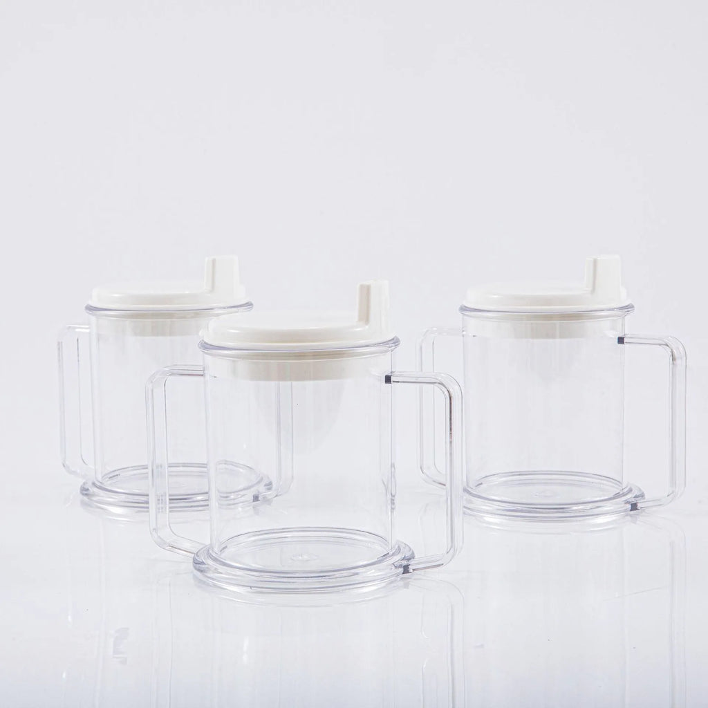 Transparent spill-proof plastic drinking cup showing 14cm height and 12cm diameter