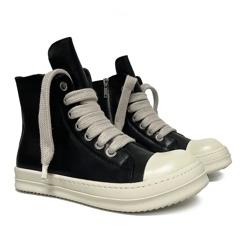 Black genuine leather high-top sneakers with side zip and stitching details on round toe design
